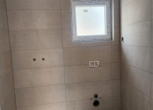 Fotografija 11 - Prodaje se moderan stan s vrtom u Vodicama – novogradnja u mirnoj ulici blizu centra!